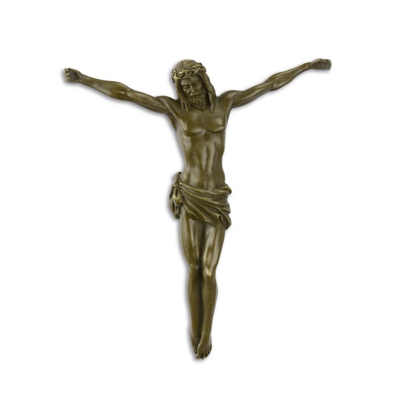 Een bronzen beeld/sculptuur van het lichaam van Christus, voor aan de wand
