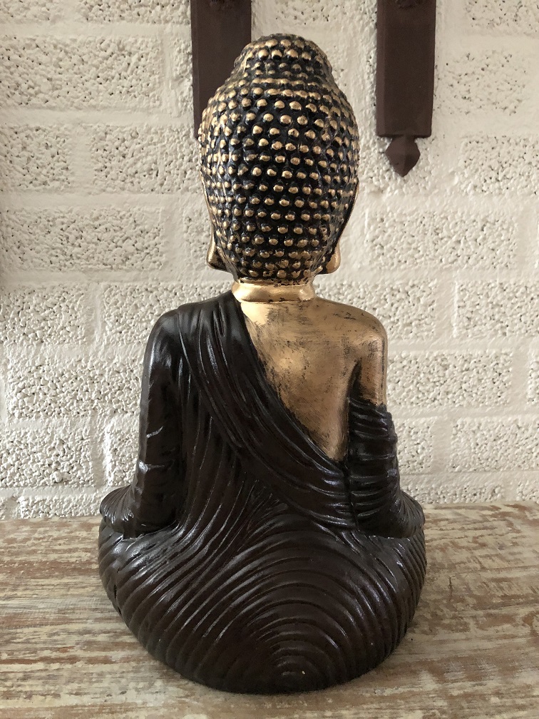 Boeddha beeld ceramic zittend Thais in kleur.