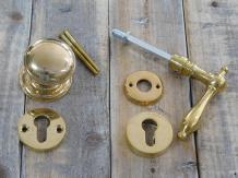 Türgarnitur mit Türknauf, Falle, Sicherheitsrosette und Sicherheitsschloss Messing