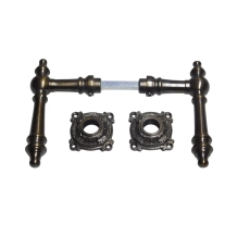 Set deurklinken Montreux met rozetten – gepatineerd messing