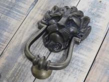 Heurtoir Lion, fonte, couleur laiton patiné