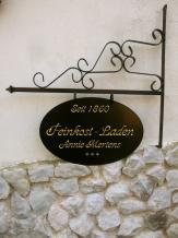IJzeren wandbord - groene winkelbord - historische decoratie