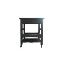 Een koloniaal hardhouten serveertafel, rolbare tafel