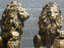 Satz mit 2 Löwen - schwarz/gold - Polystone