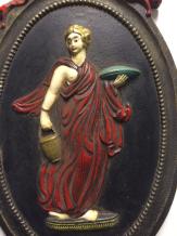 Wanddekoration aus Gusseisen - römische Figur - Bogenrahmen